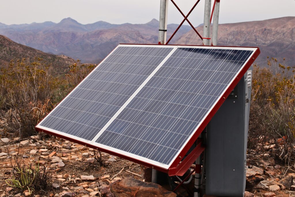 A solar power panel. This image can be used to represent the concept of renewable energy or living off the grid.